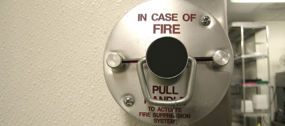 What are the different types of clean agent fire suppression systems?